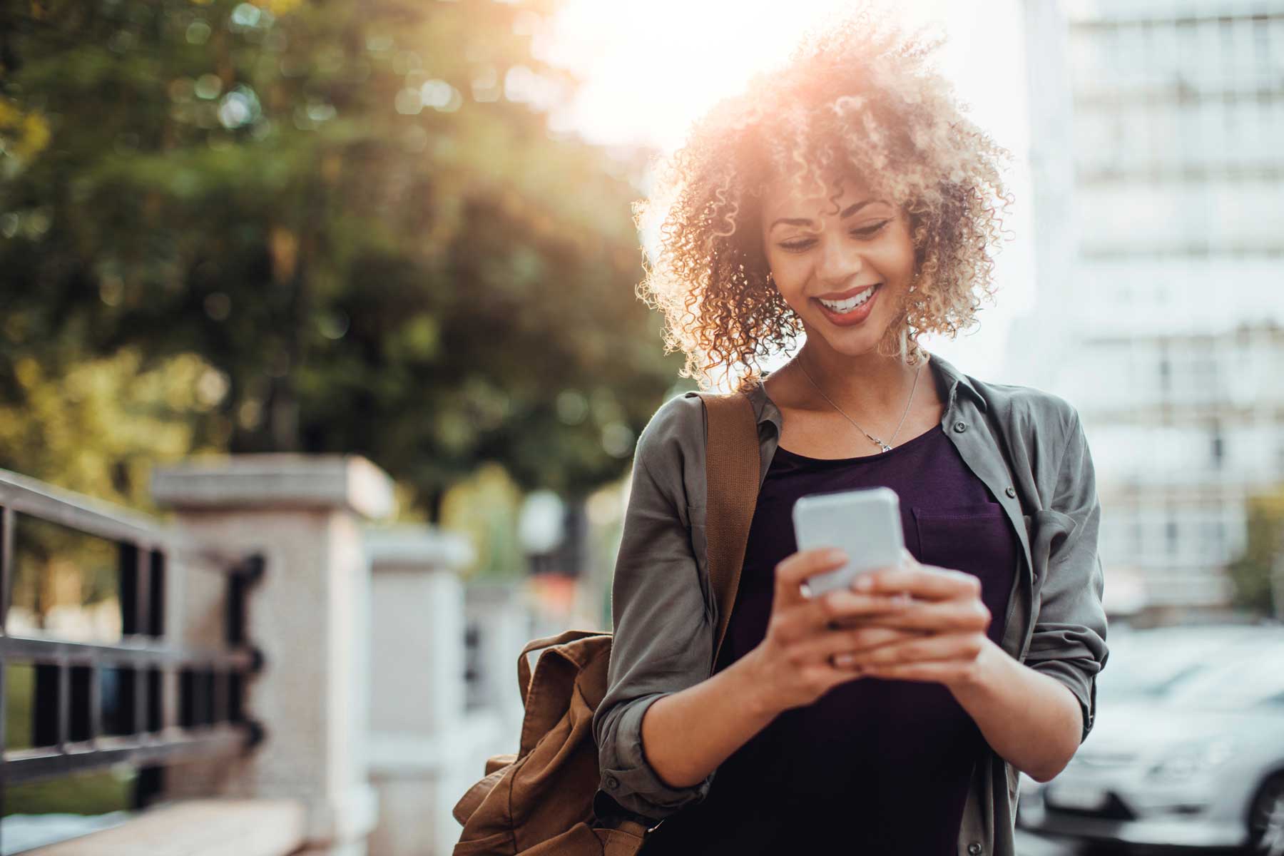 Photo of a woman using smart phone